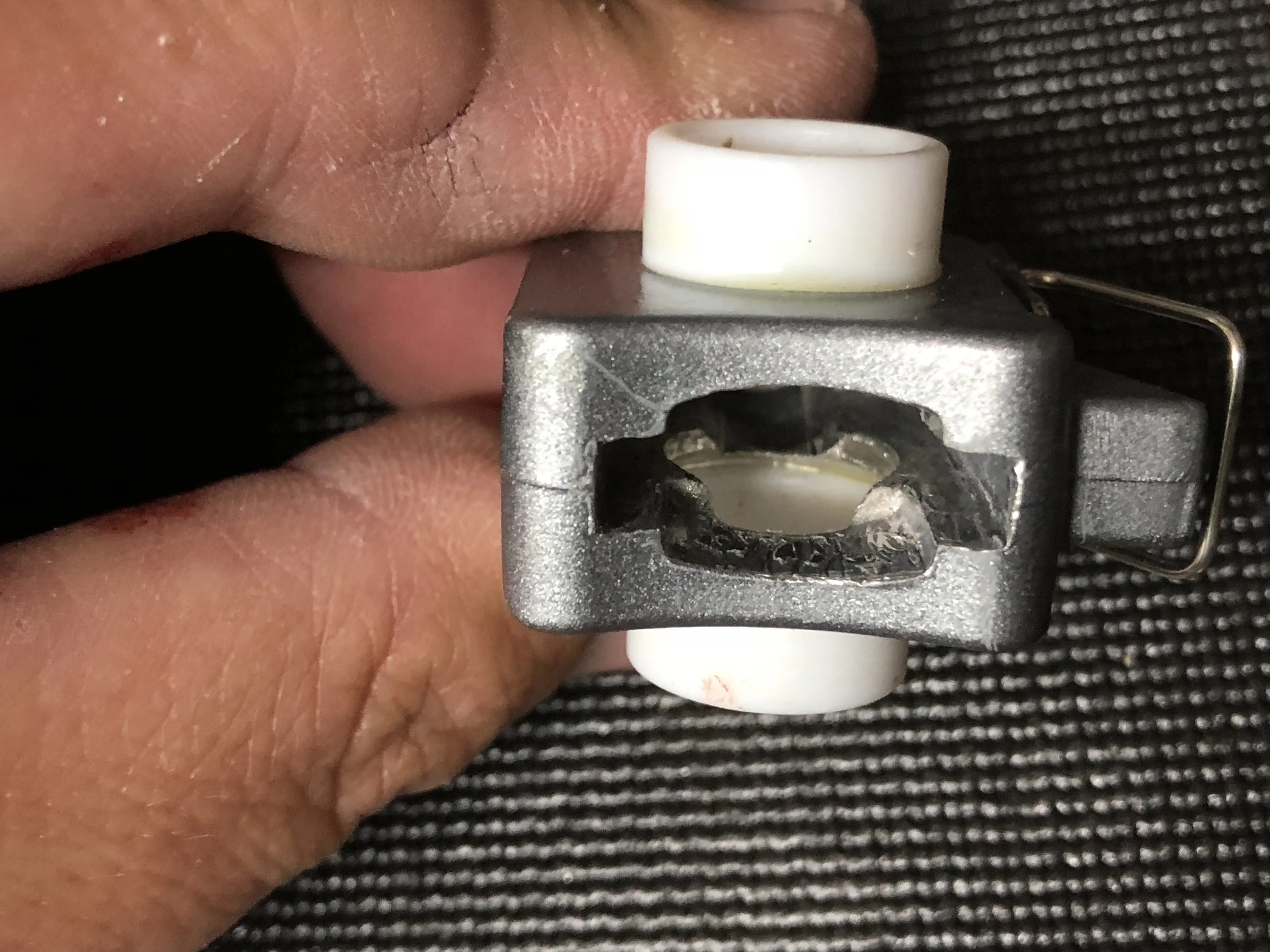  This part is a bit tricky, showing the finished product. When you epoxy the sleeve bearings the epoxy will want to run everywhere. Be somewhat sparing but make sure you cover all the mating surfaces and wipe up any excess before it has a chance to set. In my case, I had some leak into the channel for the orange mechanical fuse that I had to scrape and file out. Not a huge deal and easy to fix but if you can prevent it even better. I used a toothpick to apply the epoxy in the hole and then around the bearing once it was inserted into the hole than I set it aside for a day. 